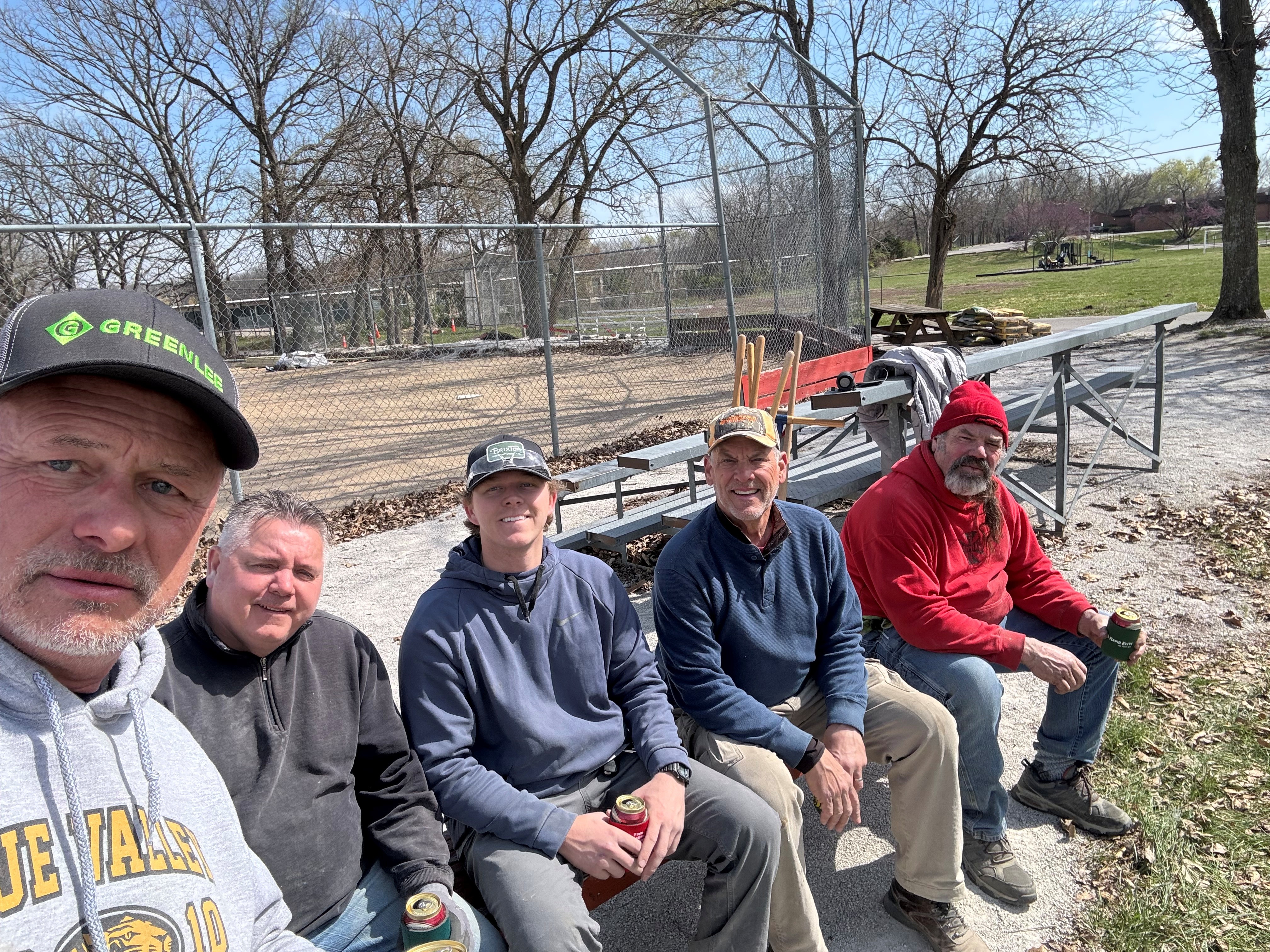 Group of men smiling to the camera